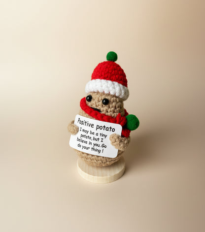 Positive Potato Weihnachts-Edition mit einem hellbeigen Hintergrund